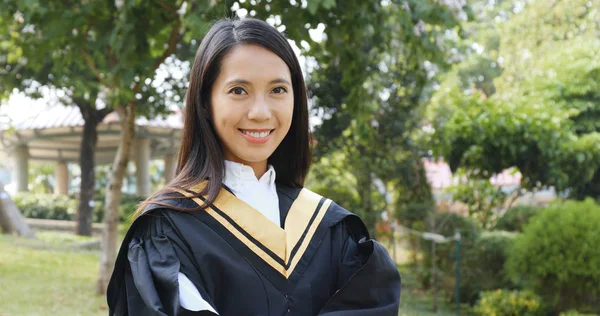 Confident graduation woman smile to camera