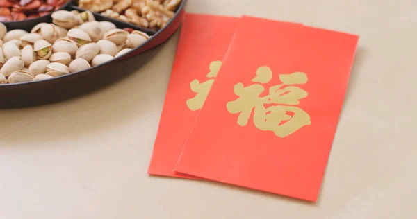 Chinese New Year Assorted Snack Tray Red Pocket Red Poacker — Stock Photo, Image