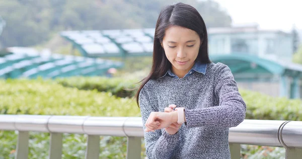 Woman using smart watch