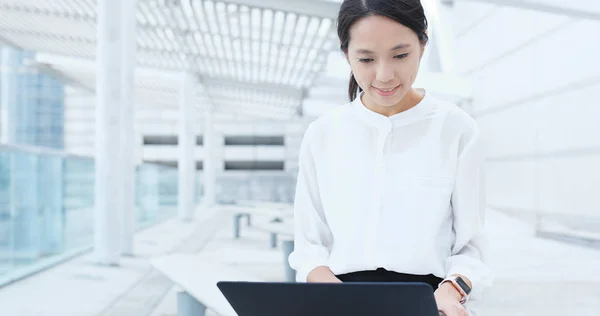 stock image Asian woman working on laptop computer