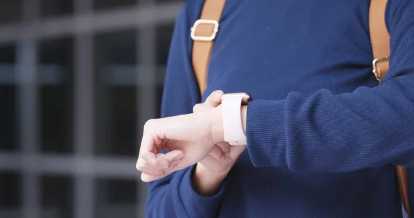 Woman using smart watch