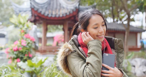 Woman Listen Music Wearing Winter Jacket Chinese Garden — Stock Photo, Image