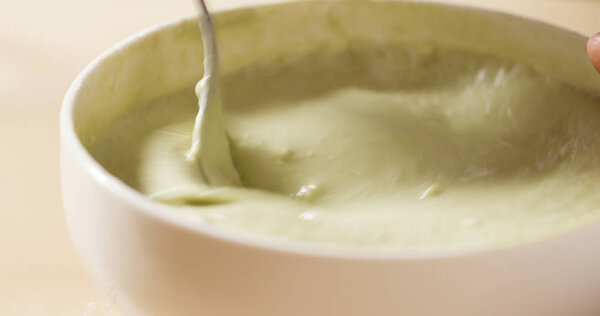 Stirring flour mixing on bowl 