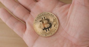 El tutma bitcoin yakın çekim