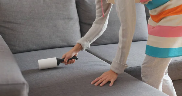 Woman Cleaning Sofa Sticky Roller — Stock Photo, Image