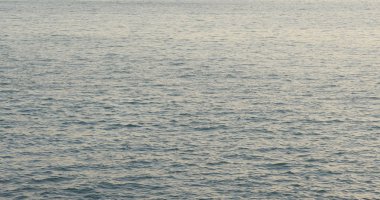 Gün batımı ve deniz dalga görünümü