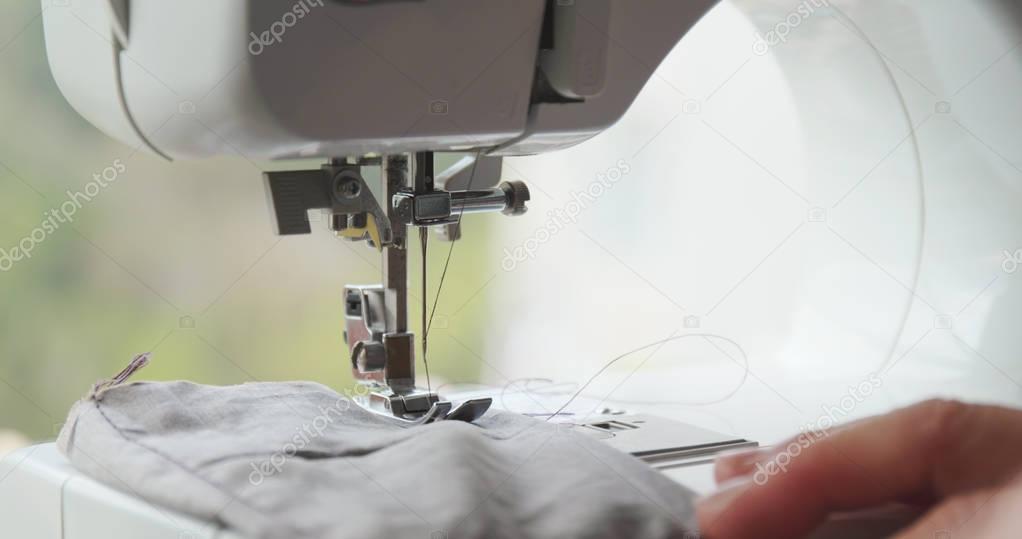 Sewing Machine in action close up 