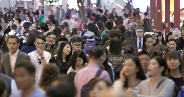 Causeway Bay, Hong Kong - 17 March, 2018: Crowded of people crossing the street at night in Hong Kong 