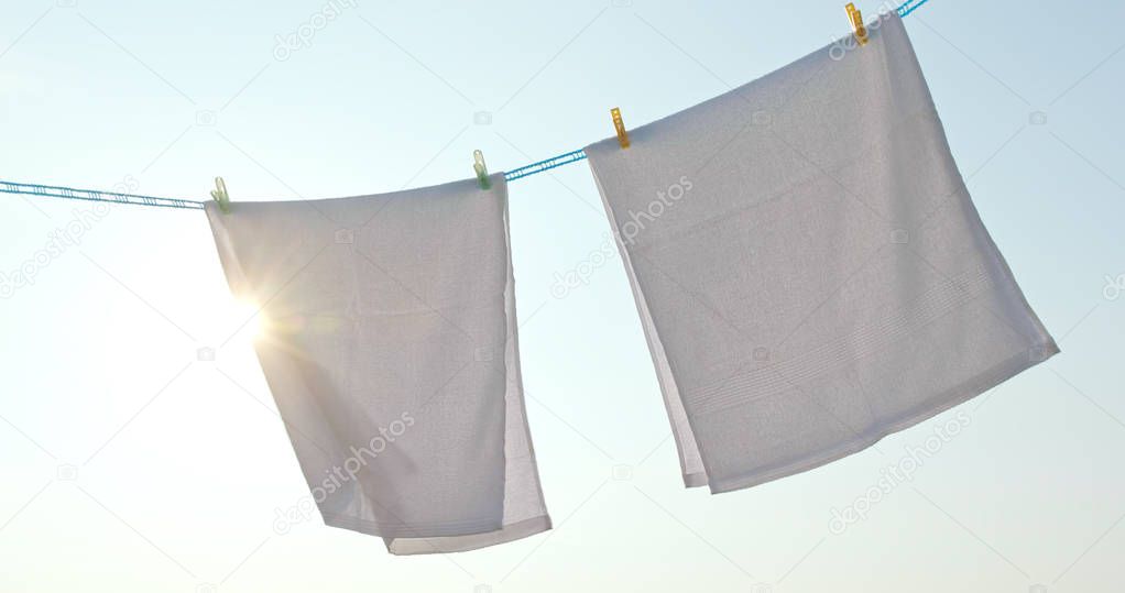 Towels dry under sunlight 