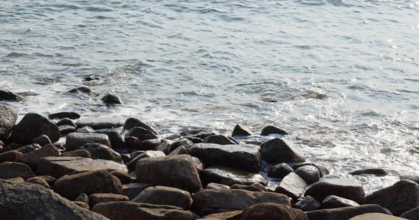 Sand beach water wave of rock and stone at outdoor — Stock Photo, Image