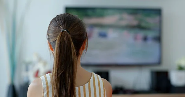 Woman watch tv at home