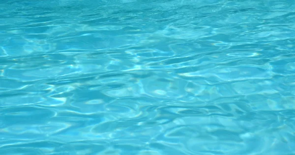 Swimming pool water wave in blue color — Stock Photo, Image