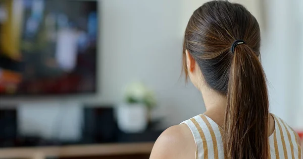 Woman watch tv at home