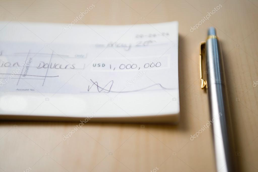 One Million Dollar written in Cheque 