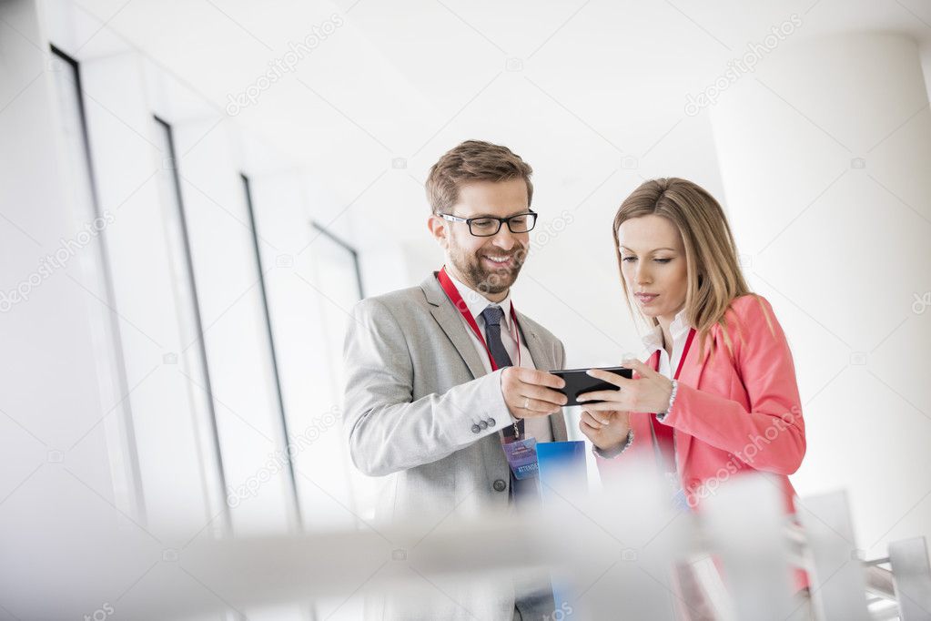 Business people using smartphone 