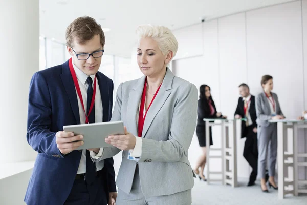 Business people using digital tablet — Stock Photo, Image