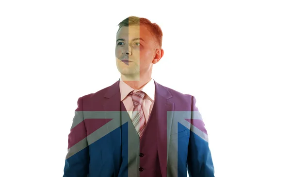 Zakenman permanent over Union Jack — Stockfoto