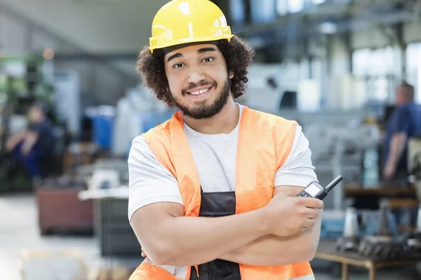 Confident manual worker in metal industry — Stock Photo, Image