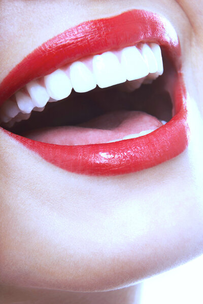 Laughing woman with red lips 
