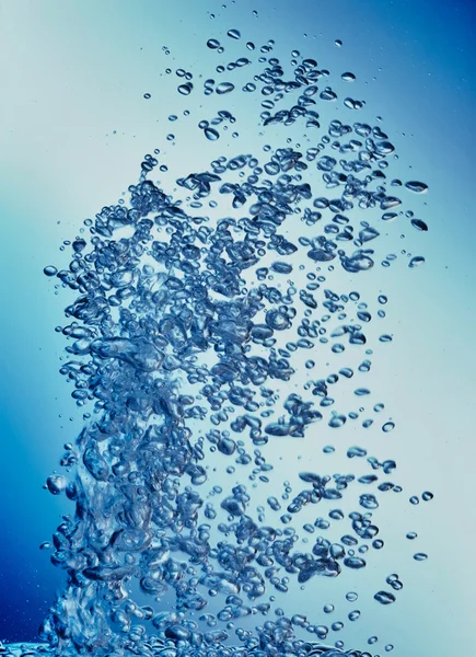 Ar borbulhando para cima através da água — Fotografia de Stock
