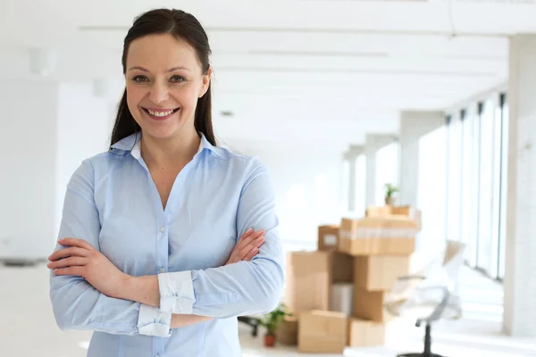 Businesswoman in new office — Stock Photo, Image