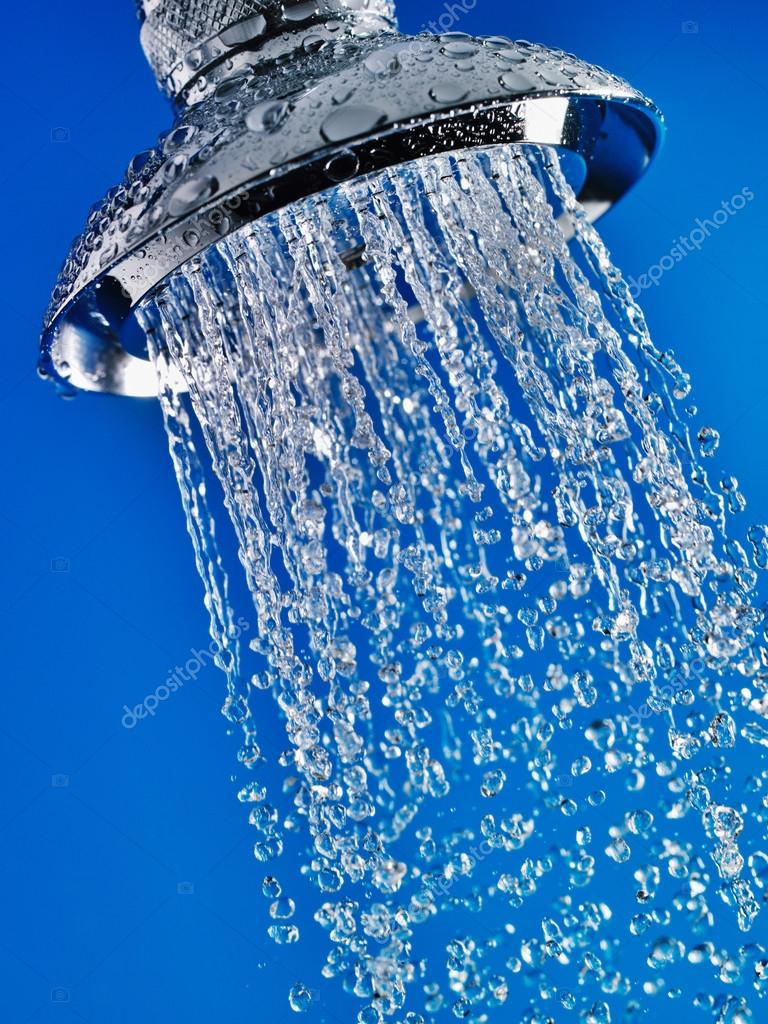Water flowing out of chrome shower head — Stock Photo © londondeposit
