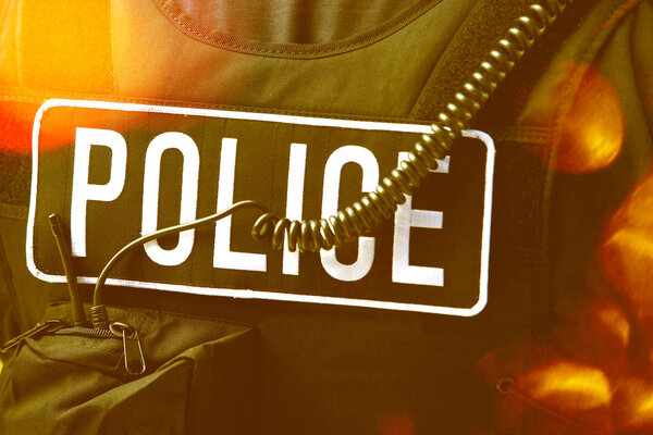 Policeman's sign on protective jacket