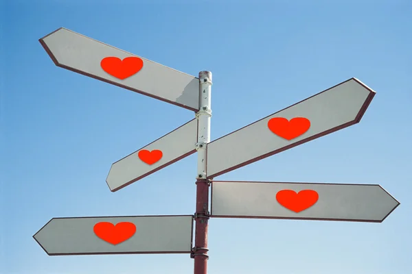 Signpost with red heart — Stock Photo, Image