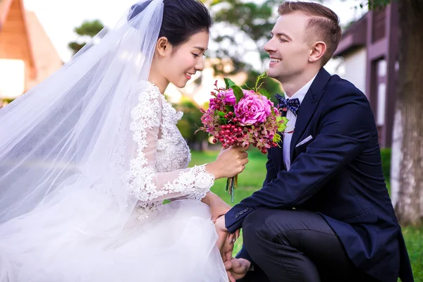 Bridegroom looking at beautiful bride — Stock Photo, Image