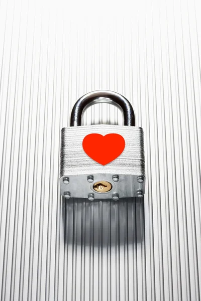 Padlock with read heart sign — Stock Photo, Image