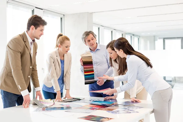 Team of design professionals having discussion — Stock Photo, Image