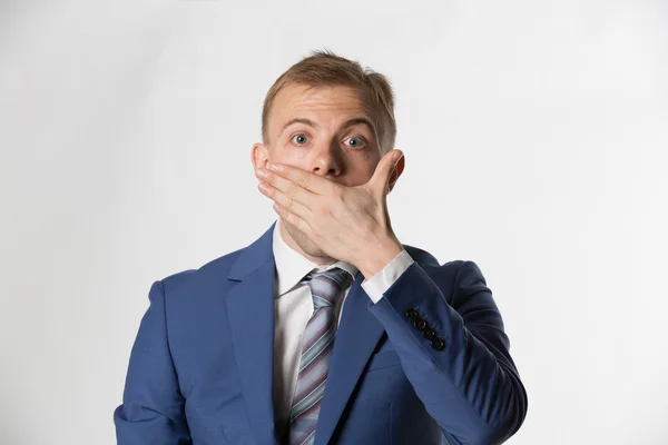 Shocked Businessman covering mouth — ストック写真