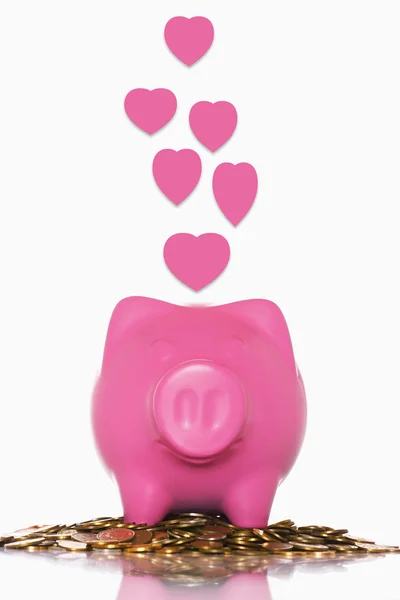 Piggy Bank do amor com o sinal ouve — Fotografia de Stock