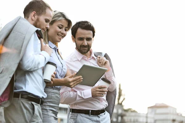 Businesspeople using digital tablet — Stock Photo, Image