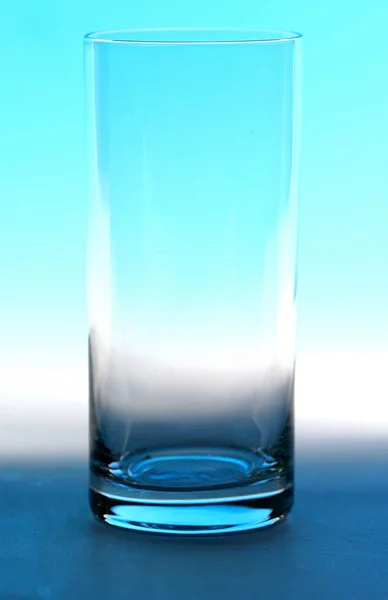 Vidrio vacío en azul — Foto de Stock