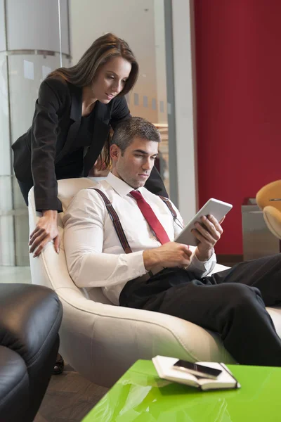 Businesspeople using digital tablet — Stock Photo, Image