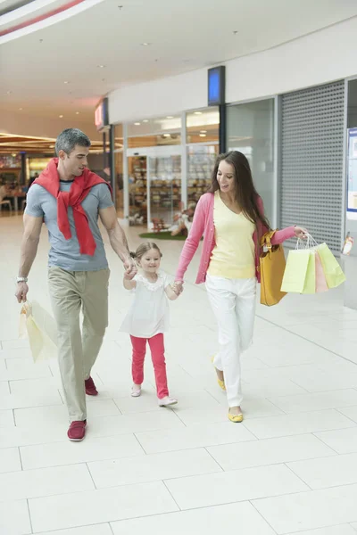 Girl holding parents hands — Stock Photo, Image