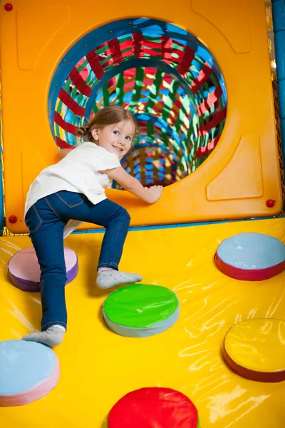 Little girl in play gym — Stock Photo, Image