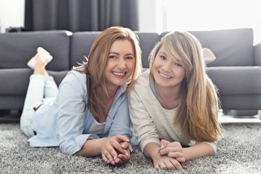 Smiling mother and daughter clipart