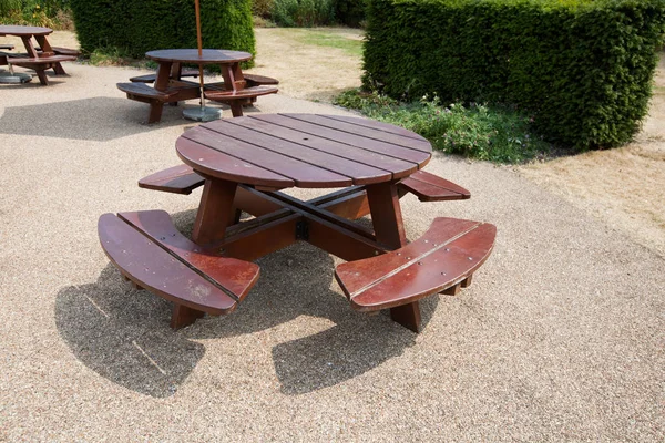 Wooden picnic tables — Stock Photo, Image