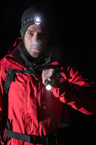 Hiker with flashlight at night — Stock Photo, Image