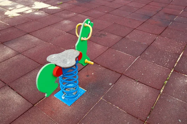 Toy horse in playground — Stock Photo, Image