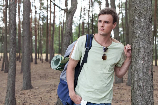 Handsome young man with backpack — Stock Photo, Image