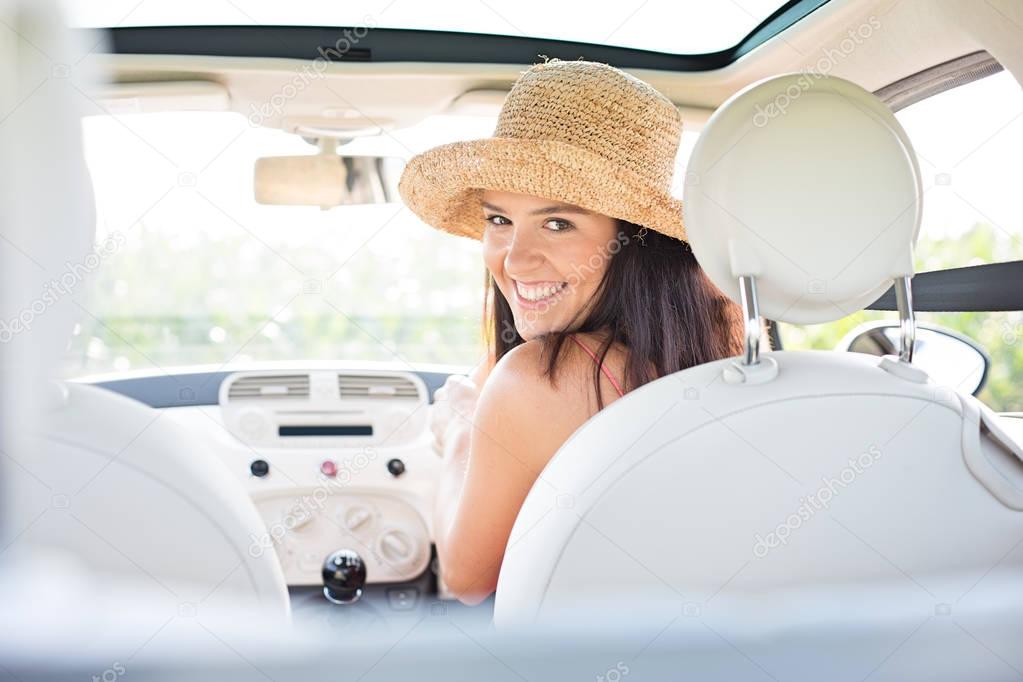 beautiful woman driving car