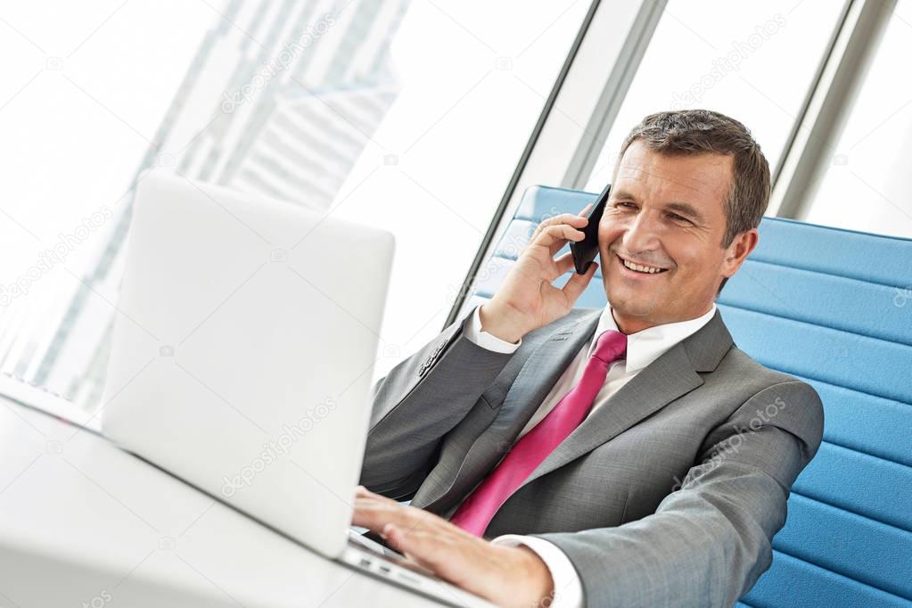 businessman talking on cell phone