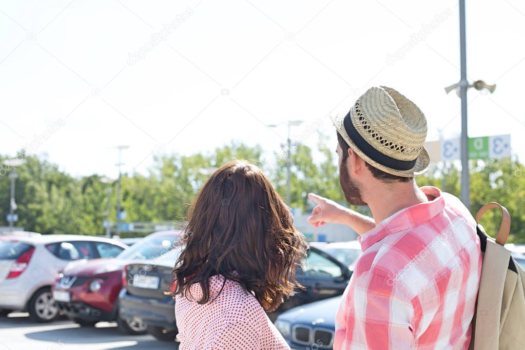 Man showing something to woman