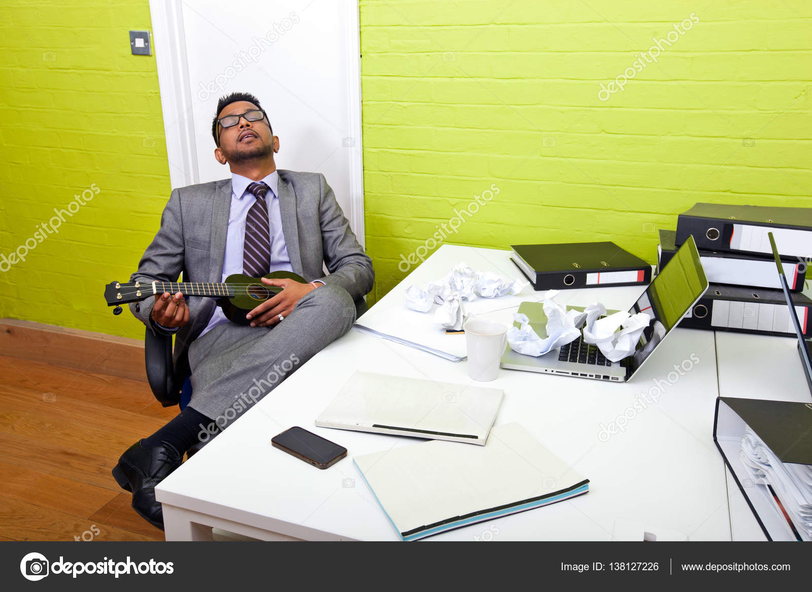 Indian Businessman Asleep At Desk Stock Photo C Londondeposit
