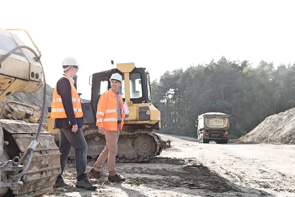 Supervisors walking at construction site — Stock Photo, Image