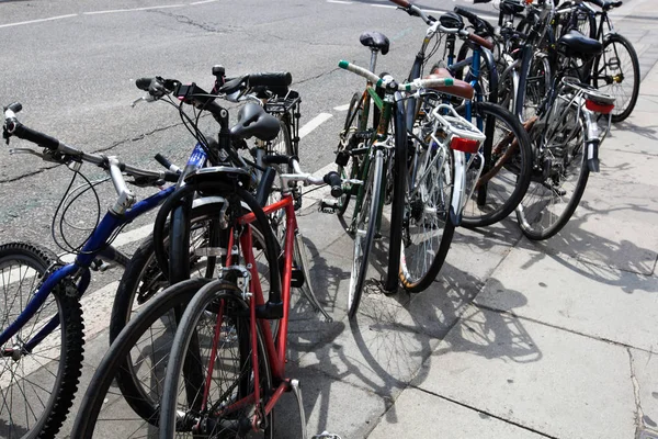 Bikes parked on street — Stock Photo, Image