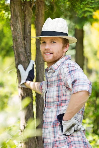 Confident gardener at plant nursery — Stock Photo, Image